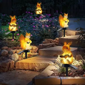 Solar-powered Ground Stake Rabbit-shaped Resin Animal Lamp with Metal Lamp Body IP66 Rated for Outdoor Garden and Courtyard Use